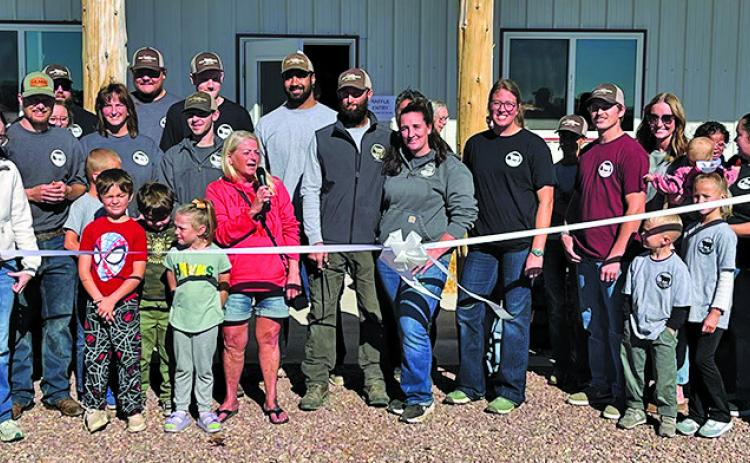 Courtesy Photo Wyatt Family Meats, located north of Hay Springs, cuts the ribbon at their Open House on Saturday, Oct. 17. The business welcomed in 800+ guests for the event.