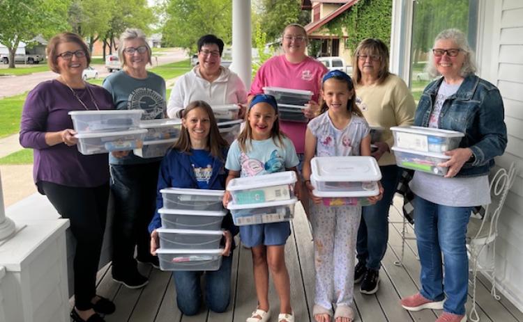 (Courtesy Photo) Members of Delta Kappa Gamma donated grooming kits which were delivered to schools in Gordon, Rushville, Hay Springs, and Chadron during the month of June. Those pictured above include: Front row: (L-R) Gordon-Rushville Public Schools Nurse Ashlei Tausan, Karley Tausan, and Grace Tausan. Back row: (L-R) Jean Hensley, Jolee Nielsen, Kay Kruger, Shayley Kersey, Sandi Muirhead, and Ann Petersen.