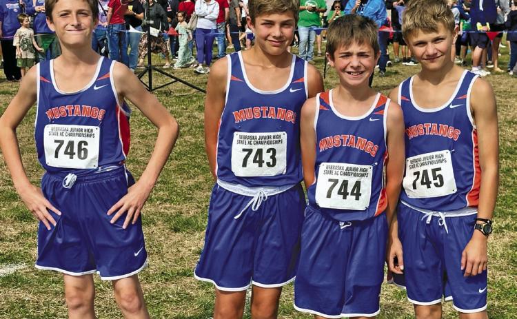 (Photo by Scott Bidroski) The 2025 Gordon-Rushville Middle Schools Boys Cross Country team prepares at the Start Line for the 2025 Nebraska Middle School Championships in Papillion, Neb. on Saturday, October 11. The group includes (L-R) Logan Leonard, Nixon Banks, Braxton Bidroski, and Cordell Dehning.