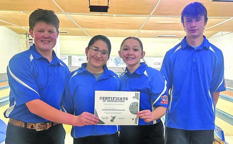 Courtesy Photo The Gordon-Rushville Unified Bowling squad of Kaden Jackson, Jocelynn Hruby, Cecelia Deaver, and Cameron Sandoz took home the top spot at their home tournament on Saturday, November 8. The tournament featured eight area teams all competing at King Pin Lanes in Gordon.