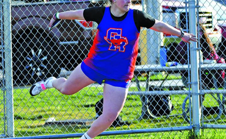Photo by Melissa Grover Senior McKinley Grover spins her way to a new school record in the Discus at Best of the West. The Wayne State College signee’s throw of 145-8.5.00 puts her in first place all-time in the Mustang record books.