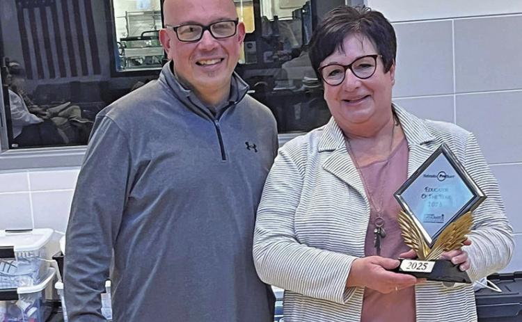 (Courtesy Photo) Gordon-Rushville ProStart educator Kay Kruger (right) stands with the Executive Director Nebraska Hospitality Association Craig Casados (left) after receiving the 2025 Nebraska ProStart Educator of the Year award.