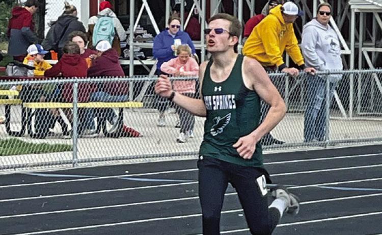 Photo by Jessica Mintken Hawks sophomore Mason Albrecht digs deep during his first place finish in the 800 meter race on Friday, May 3.