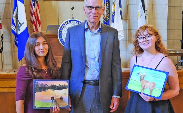 Courtesy Photo Lt. Gov. Joe Kelly and Nebraska Department of Water, Energy, and Environment Director Jesse Bradley honored 13 students whose artwork was chosen to be part of the 2027 “Nebraska: Don’t Waste It!” Calendar. Pictured with the Lt. Gov from Gordon-Rushville High School include Eliza Golden and Haley Dane who had their artwork chosen as winners of the contest. See the full story on Page 2!