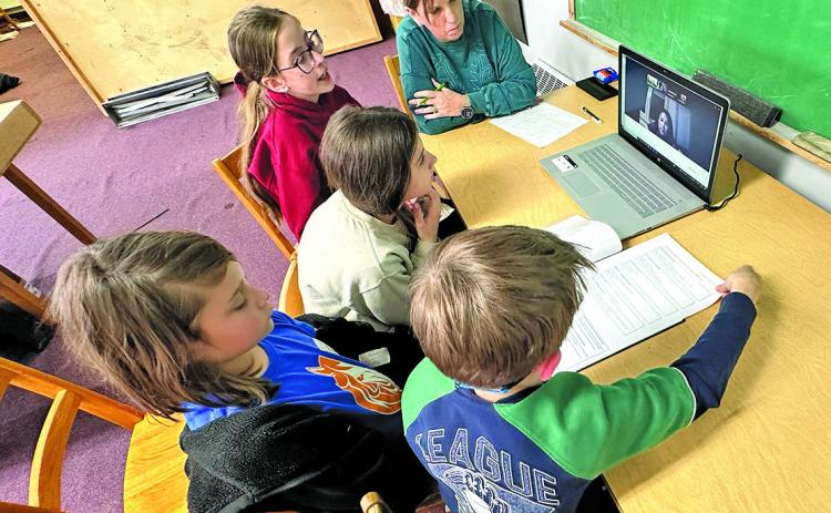 (Photo by Scott Bidroski) Members of the Duck Republic meet with Sheena Rodriguez during a Zoom call in March. Those pictured include: Gage Bidroski, Denali Hillion, Avery Kreitman, Claire Swanson, and Advisor Lydia Swanson.