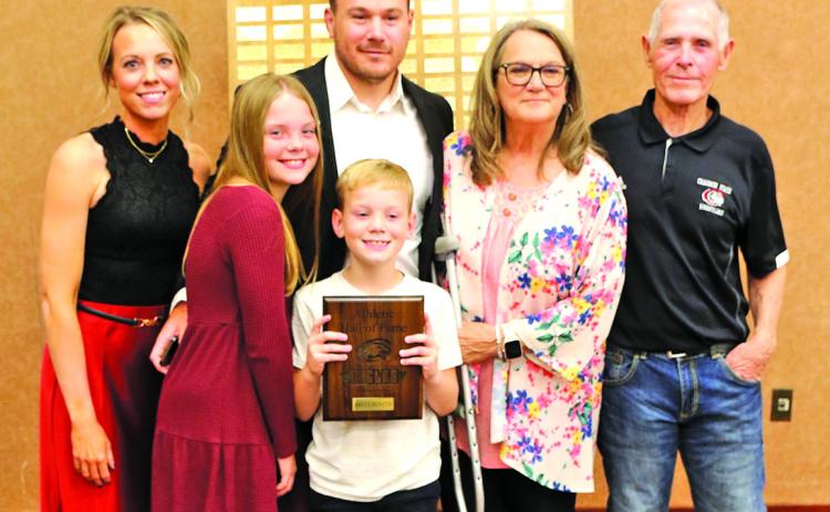 Photo by Con Marshall Brett Hunter is shown with his wife, Ashley, their children, Paisley and Jax, and his parents, Roger and Elizabeth, on Saturday, October 5, when he was inducted into the Chadron State Athletic Hall of Fame.