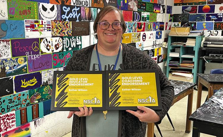 (Photo by Scott Bidroski) Gordon-Rushville Public Schools Educator Esther Wilson shows off her recent endorsements she received through the Nebraska Speech, Communication, and Theater Association (NSCTA).