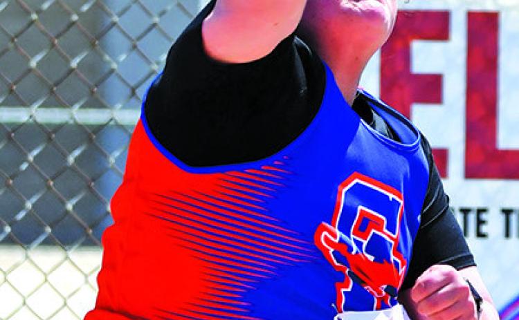 Photo by Melissa Grover Senior McKinley Grover heaves the steel towards the 40 foot mark to pick up her second medal of the weekend in the Shot Put. Grover would mark a personal best 40-02.50 to earn fourth place and her second medal.