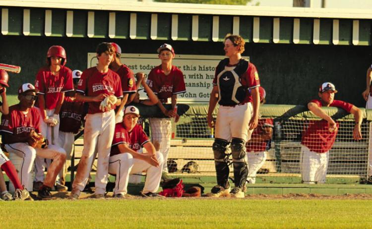 Photo by Megan Heiting The Security First Regulators look on from the dugout during a contest at Modisett Ball Park during the 2024 season.