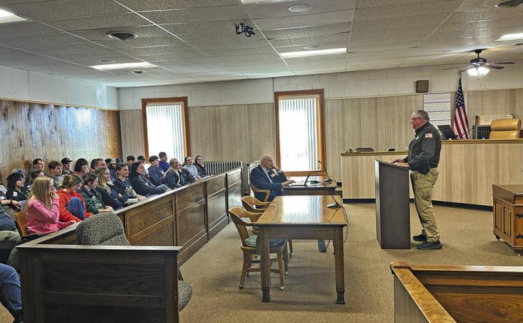 (Photo by Scott Bidroski) Sheridan County Sheriff Jeff Brewer speaks to Sheridan County seniors during the County Government Day held on Tuesday, April 7.