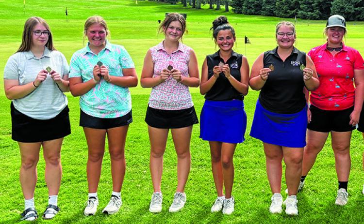 Photo by David Morris The leaders from the Western Trails Conference show off their medals. Gordon-Rushville’s Katie Coomes, far left, took home the top spot with a score of 95.