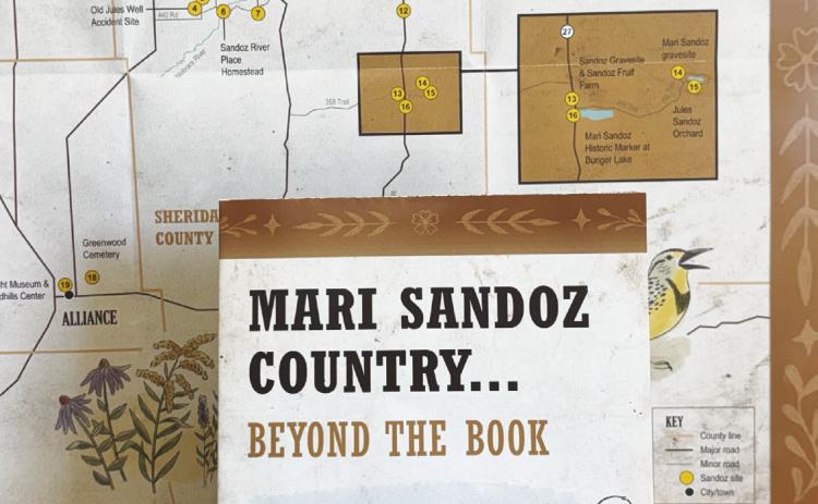 (Photo by Lisa Hare) New maps produced by the Mari Sandoz Society are modeled after the original “circle tour” maps designed in the 1970s, but with a modern twist. The new Sandoz Country tour map includes all the original locations, plus newer sites such as the High Plains Heritage Center in Chadron. (Copies of the map are available at the Sheridan Country Journal Star office.)