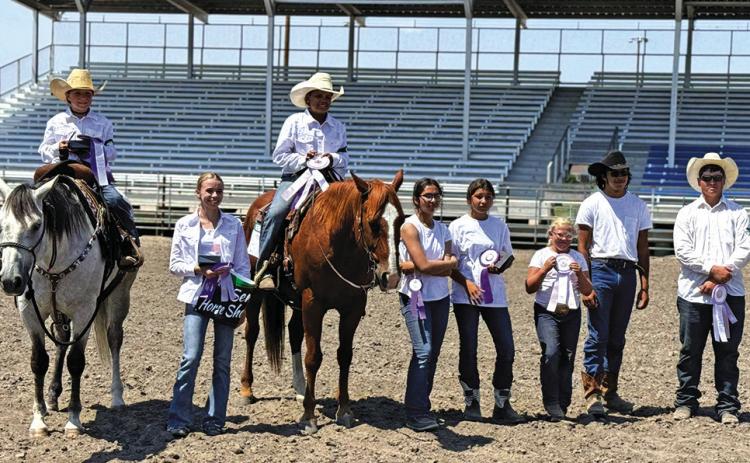 Photo by Courtney Ostrander The winners from the Sheridan County 4-H Horse Show show off the ribbons following their competition on Saturday, July 13.