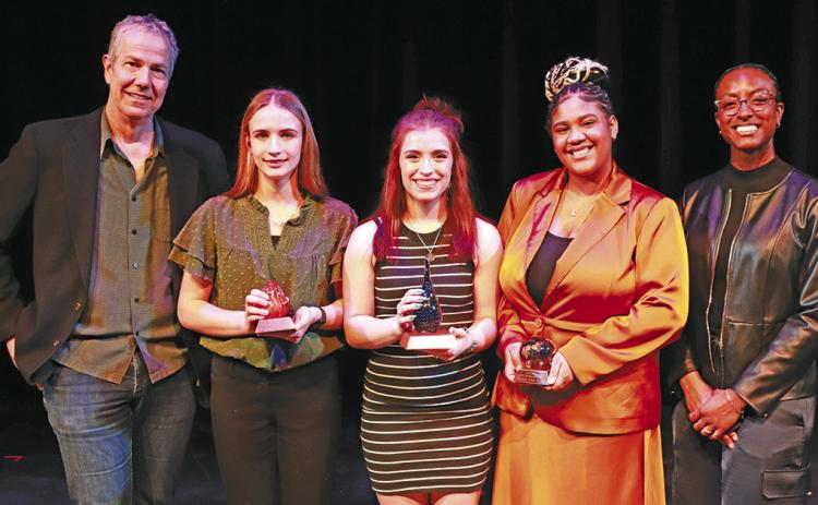 (Photo Courtesy of the Nebraska Arts Council) The top three finishers in the Nebraska State Poetry Out Loud competition take a photo following the awards presentation. Gordon-Rushville High School junior Lainey Fillmore is in the center holding the first place trophy. Joining her for the photo include: (L-R) Nebraska State Poet Emeritus Matt Mason, Mieke van der Walt, Fillmore, MajieAhna Winfrey, and Nebraska State Poet Jewel Rodgers.