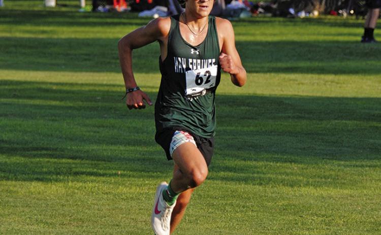 Photo by Chris Heiser Junior Parker Wellnitz pushes for the finish in Scottsbluff. Wellnitz would finish sixth overall in the race.